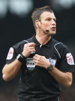 Clattenburg in the middle of the 5-0 derby